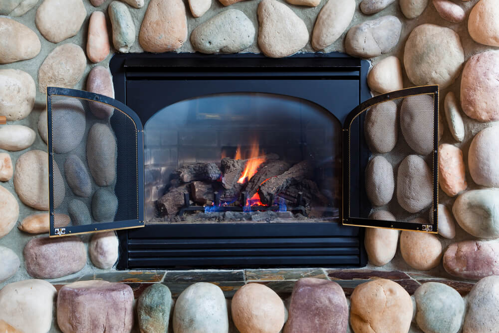 gas fireplace with open doors
